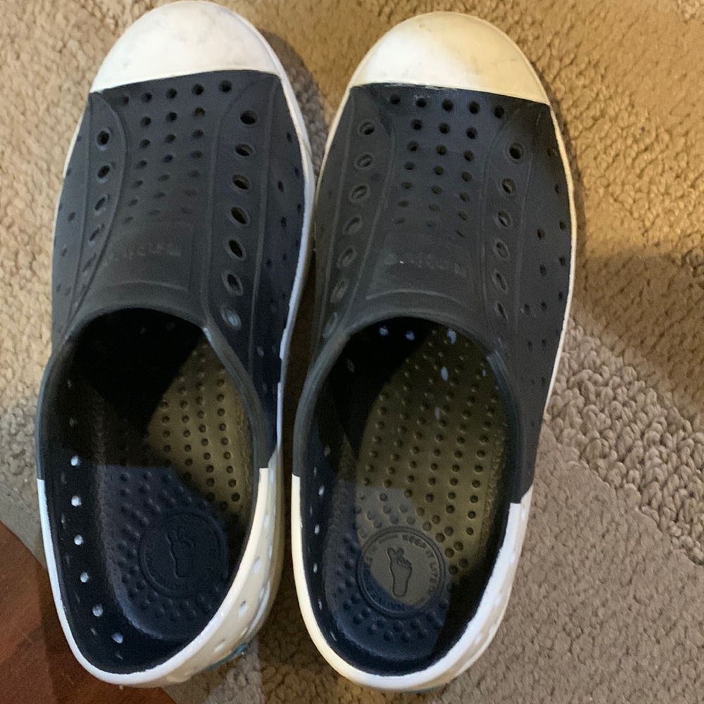 Native black plastic shoes, unisex, size 13. Gently worn
